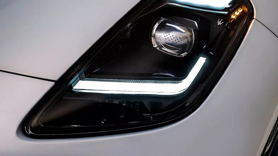headlight close-up of a Maserati GranTurismo
