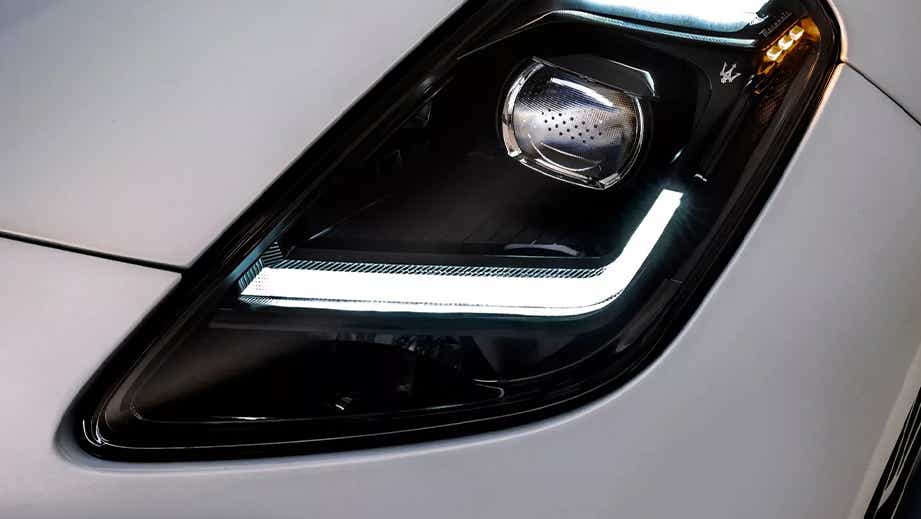 headlight close-up of a Maserati GranTurismo