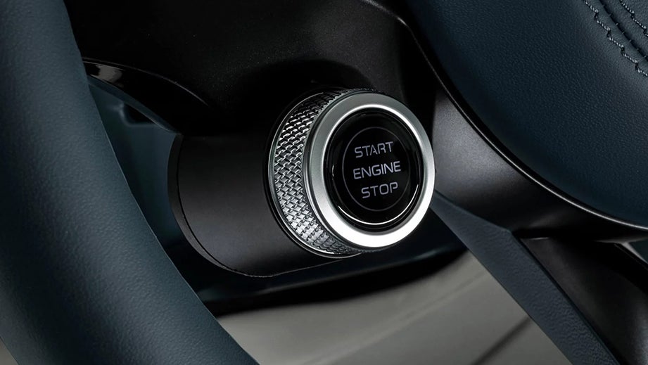 engine start/stop button close-up of a Maserati GranTurismo