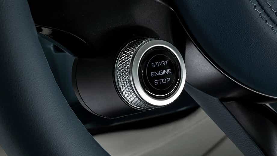 engine start/stop button close-up of a Maserati GranTurismo