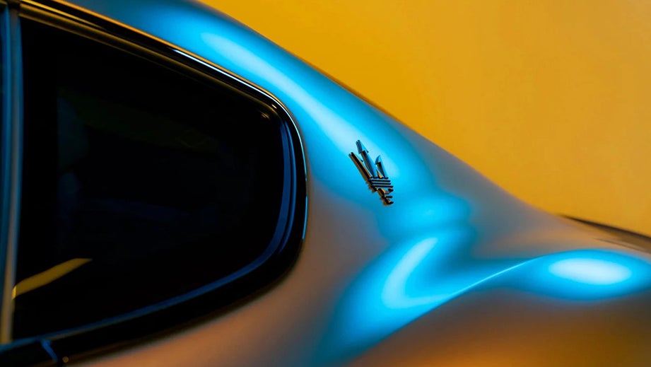 rear window and C-pillar of a Maserati GranTurismo