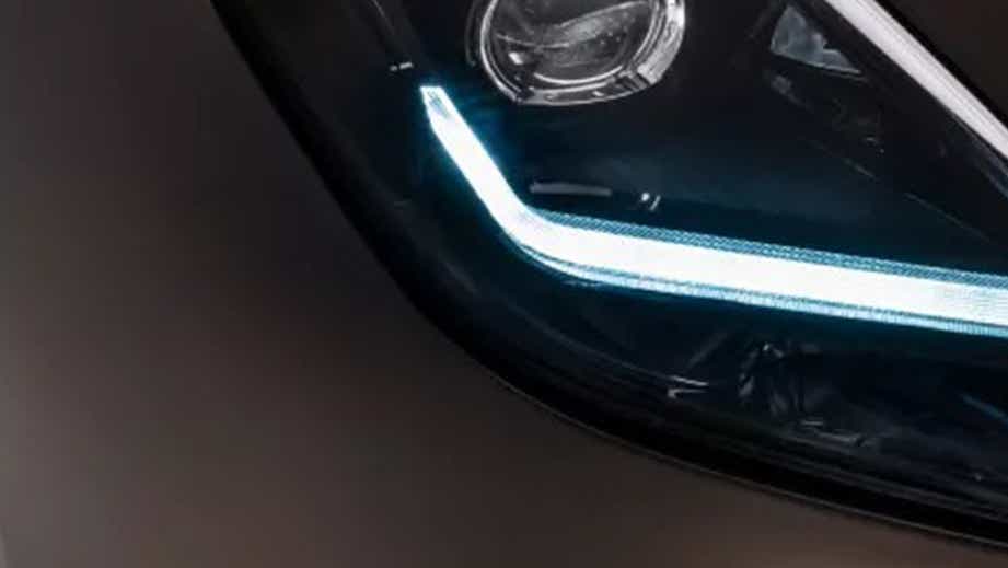 headlight close-up of a Maserati GranTurismo