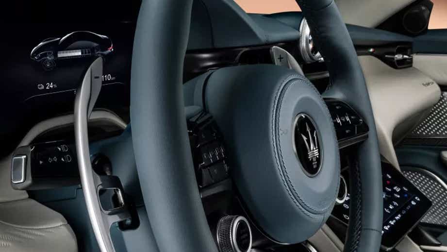 interior dashboard and steering wheel of a Maserati GranTurismo