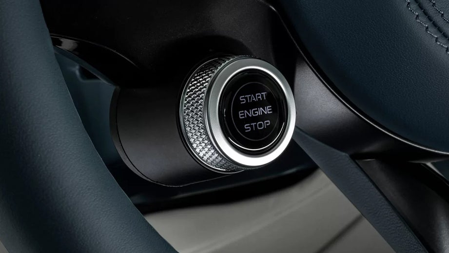 Close-up of the start/stop button in a Maserati GranTurismo