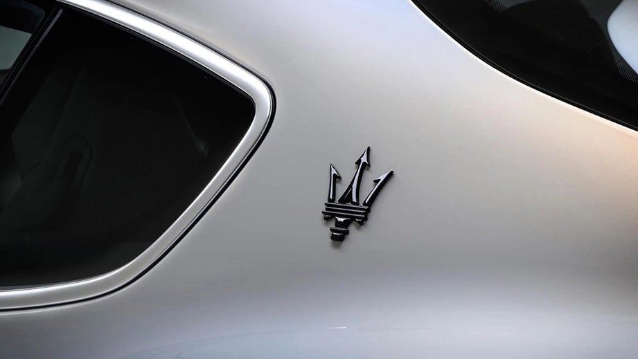 C-pillar and badge detail of a Maserati GranTurismo