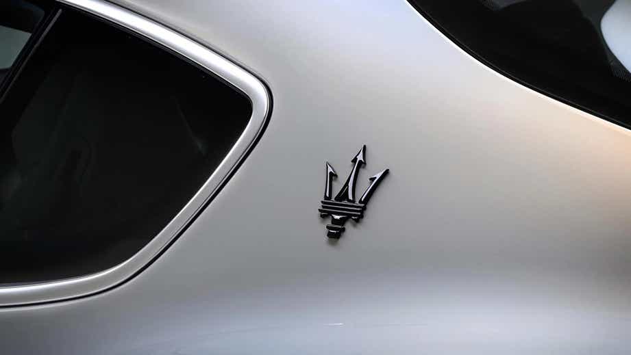 C-pillar and badge detail of a Maserati GranTurismo