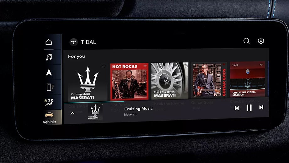 infotainment display showing music controls in a Maserati Levante