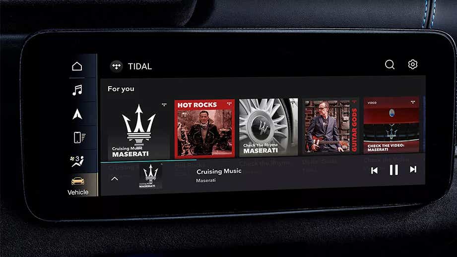 infotainment display showing music controls in a Maserati Levante