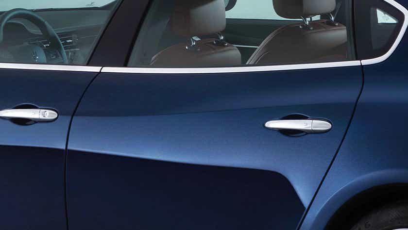 side doors and rear seats view of a Blu Nobile Maserati Quattroporte