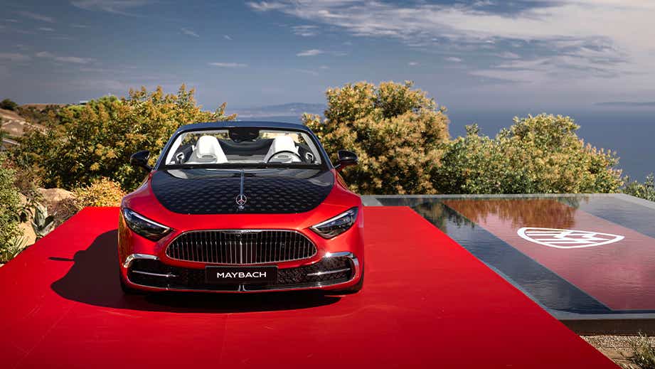 Front view of a Garnet Red Metallic Mercedes-Benz Maybach SL 680