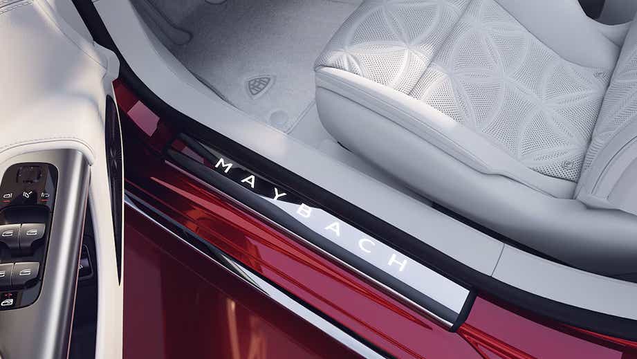 door sill and seat detail of a Garnet Red Metallic Mercedes-Benz Maybach SL 680