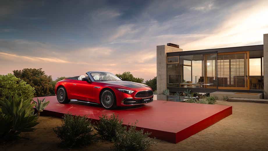 front three-quarter view of a Garnet Red Metallic Mercedes-Benz Maybach SL 680