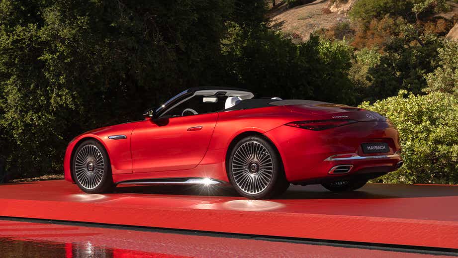 rear three-quarter of a Garnet Red Metallic Mercedes-Benz Maybach SL 680