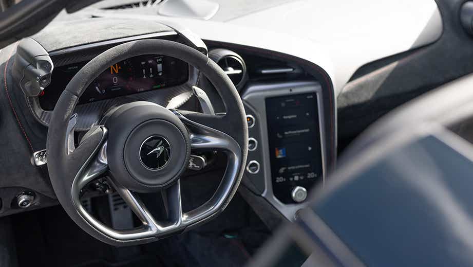 interior dashboard and steering wheel of a Mclaren 750s
