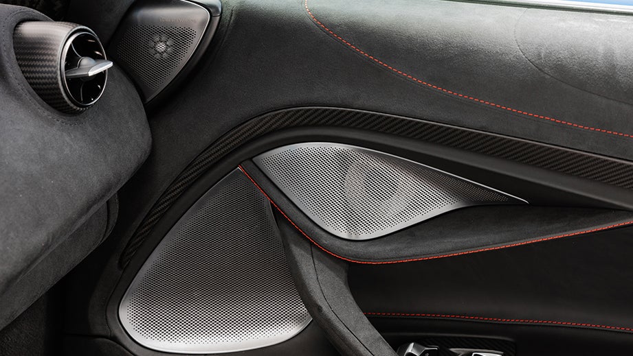 close-up of the interior door panel of a Mclaren 750s