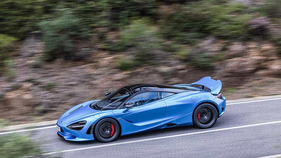 side view of a Mclaren 750s on a scenic road