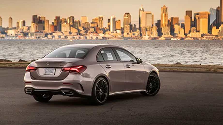 Rear three-quarter view of a Polar White Mercedes-Benz A-Class Limousine