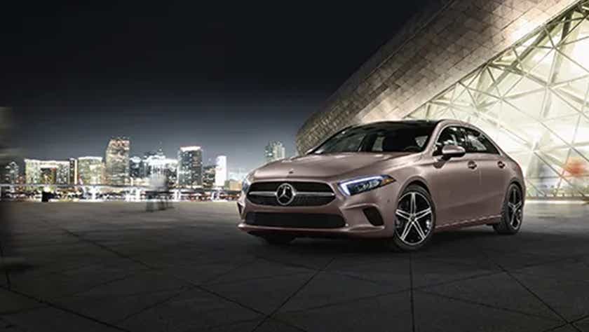 front three-quarter view of a Polar White Mercedes-Benz A-Class Limousine