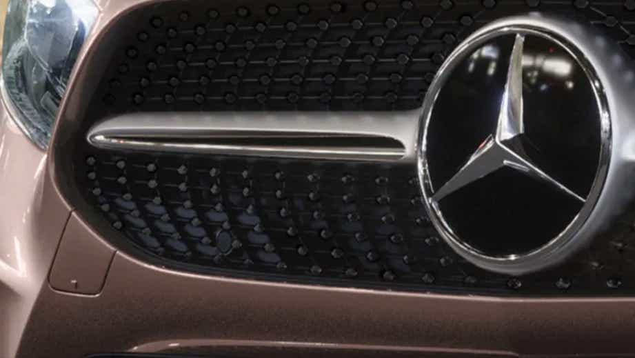 Front grille close-up of a Polar White Mercedes-Benz A-Class Limousine