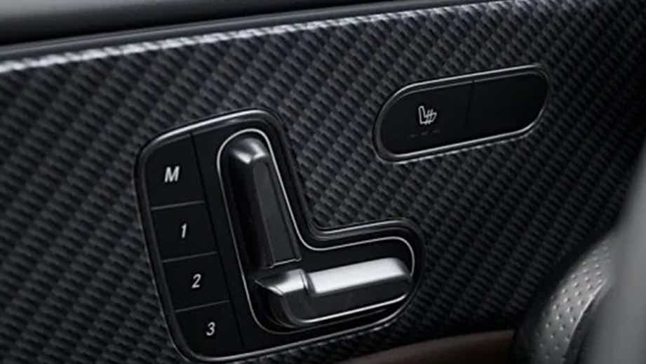 close-up of seat controls on a Mercedes-Benz Amg A 45 S door panel