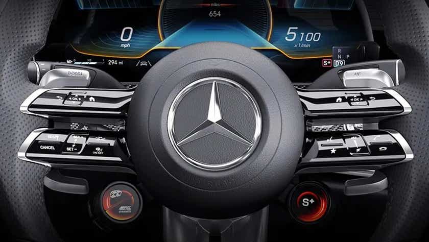 Steering wheel and dashboard of a Mercedes-Benz AMG E 53 Cabriolet