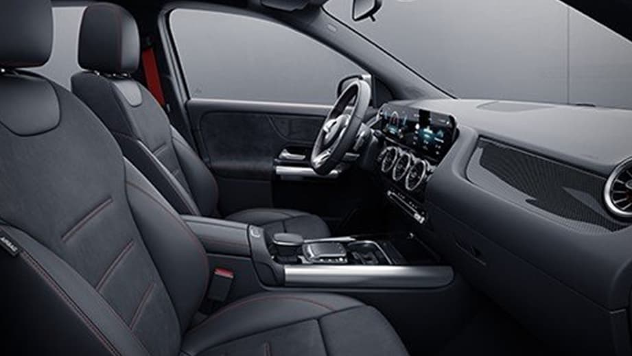 Interior dashboard and seats of a Polar White Mercedes-Benz AMG GLA 35