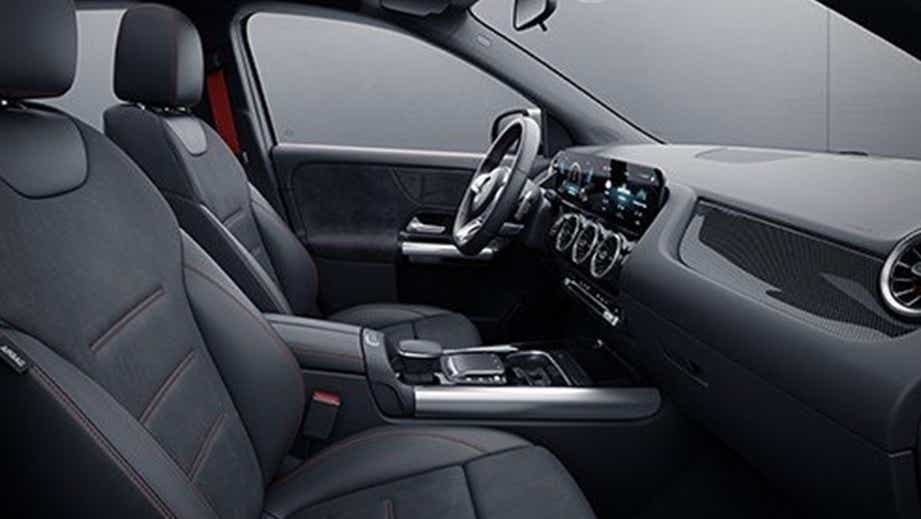 Interior dashboard and seats of a Polar White Mercedes-Benz AMG GLA 35
