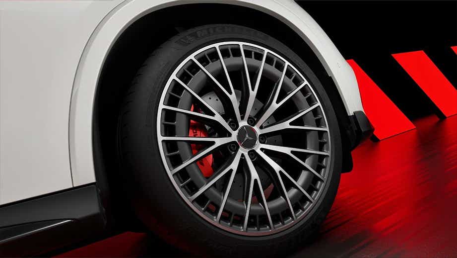 Wheel and fender close-up of a Polar White Mercedes-Benz AMG GLC 43