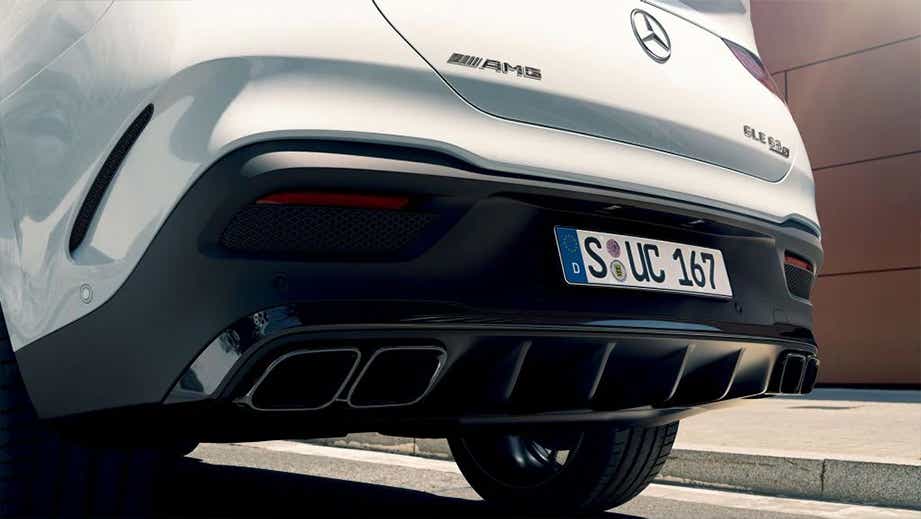 Rear bumper and exhaust view of a Polar White Mercedes-Benz AMG GLE 63 S