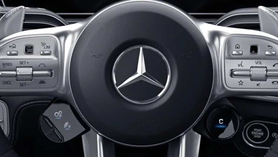 Steering wheel view of a Polar White Mercedes-Benz AMG GLE 63 S