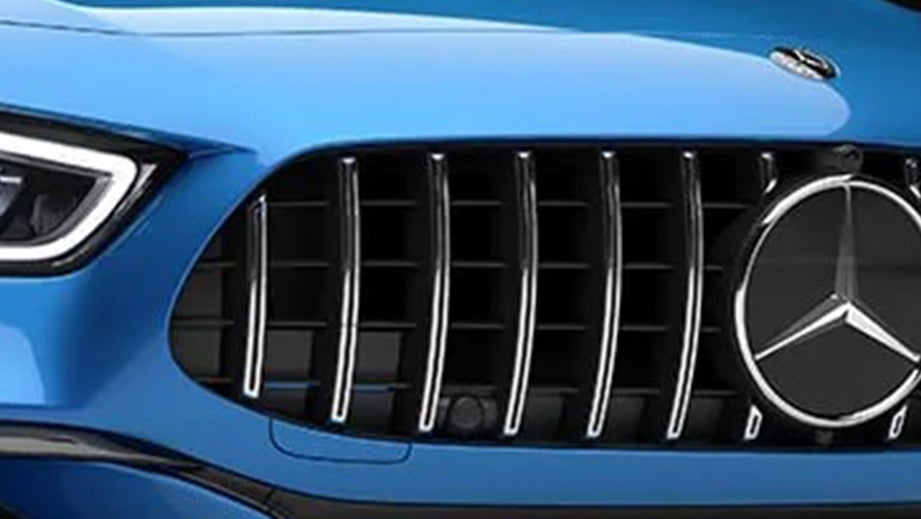 Front grille close-up of a Starling Blue Metallic Mercedes-Benz AMG GT 4 Door Coupe