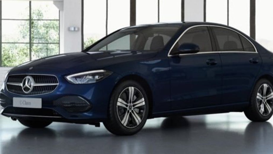 front three-quarter view of a Cavansit Blue Mercedes-Benz C-Class