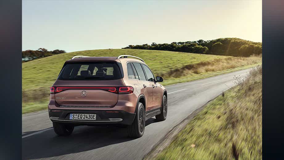rear view of a Rose Gold Metallic Mercedes-Benz EQB 2022-23 on open road