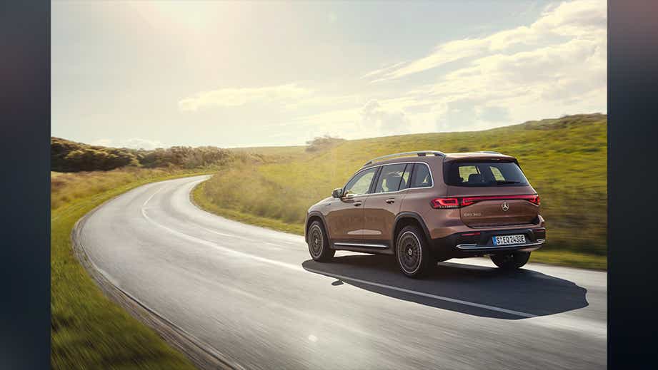 rear three-quarter of a Rose Gold Metallic Mercedes-Benz EQB 2022-23