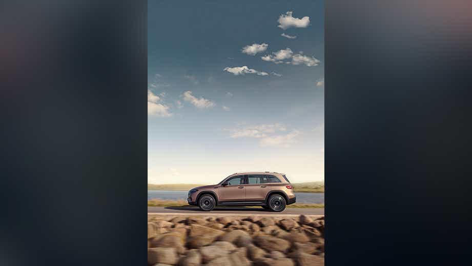 side view of a Mercedes-Benz EQB 2022-23 on an open road