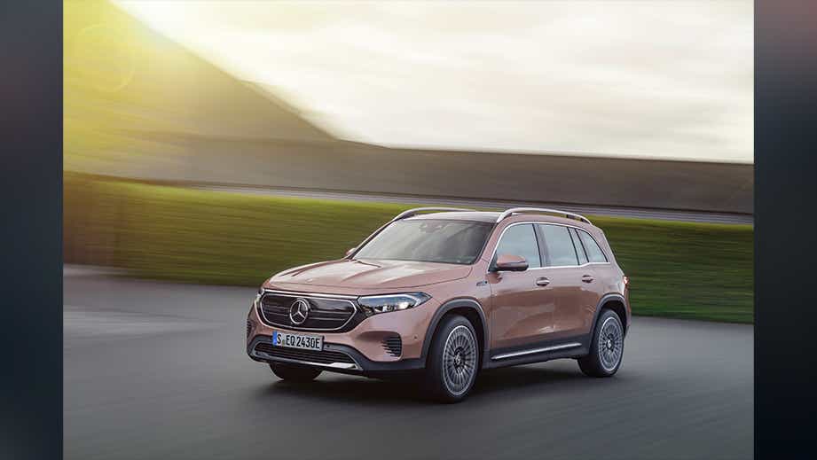 front three-quarter of a Rose Gold Metallic Mercedes-Benz EQB 2022-23