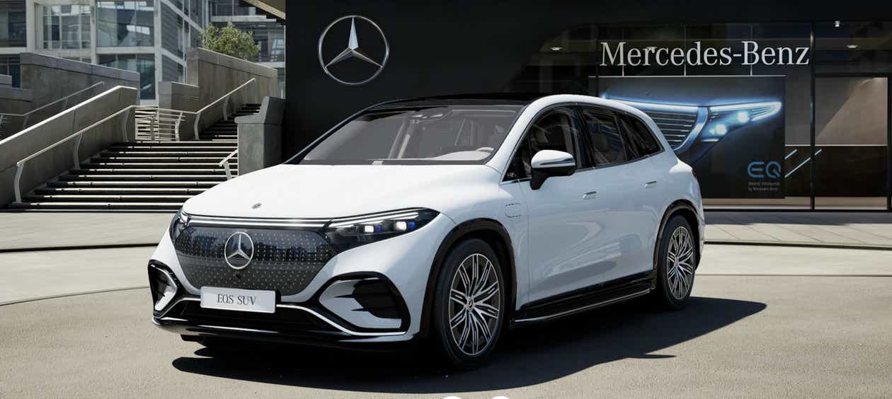 Front three-quarter view of a Polar White Mercedes-Benz EQS SUV