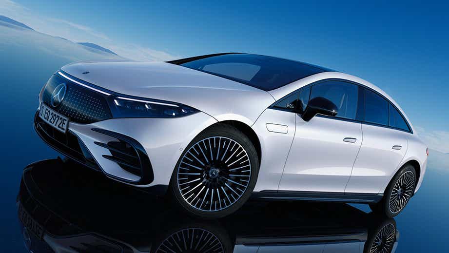 front three-quarter view of a Polar White Mercedes-Benz EQS