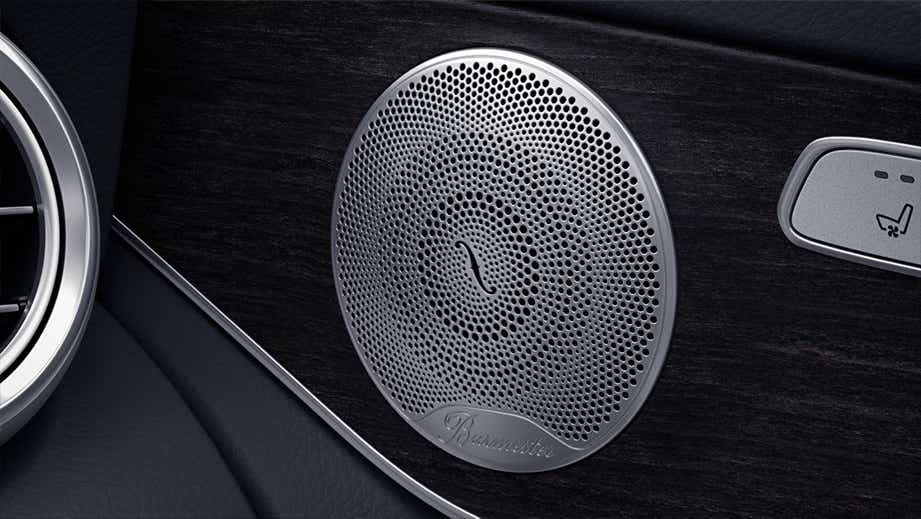 Close-up of speaker grille and seat controls in a Mercedes-Benz GLC Coupe