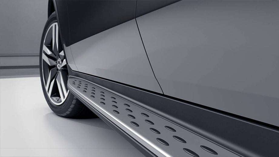 Side running board and wheel view of a Mercedes-Benz GLC Coupe