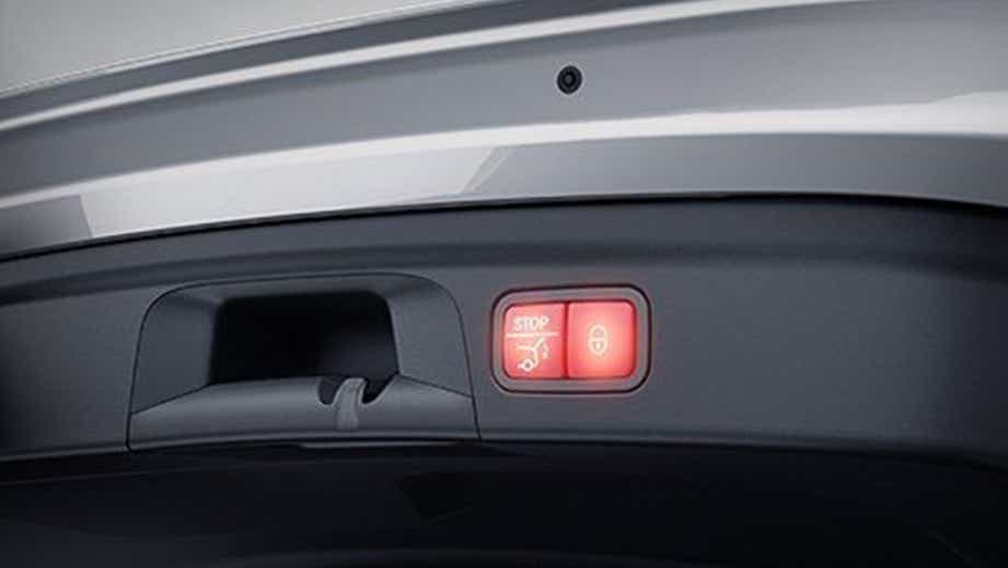 Close-up of the trunk latch and button area of a Mercedes-Benz GLE