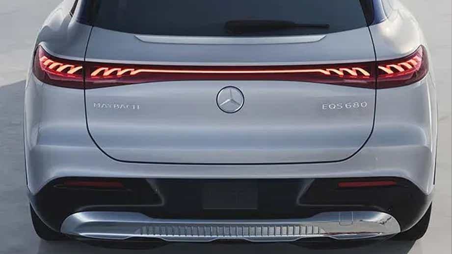 Rear view of a Opalite White Mercedes-Benz Maybach EQS