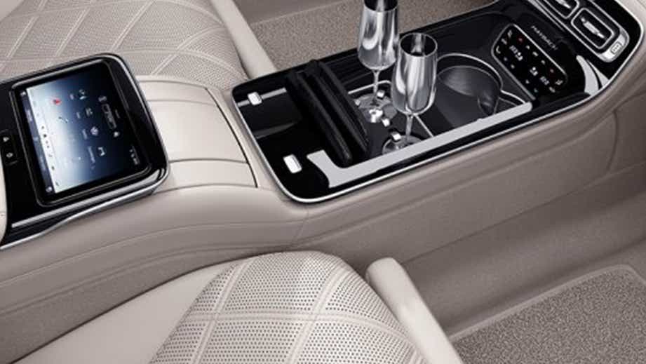 center console with touchscreen and champagne flutes of a Mercedes-Benz Maybach S-Class