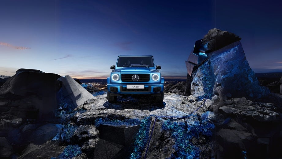 Front view of a South Seas Blue Mango Mercedes-Benz G-Class Electric