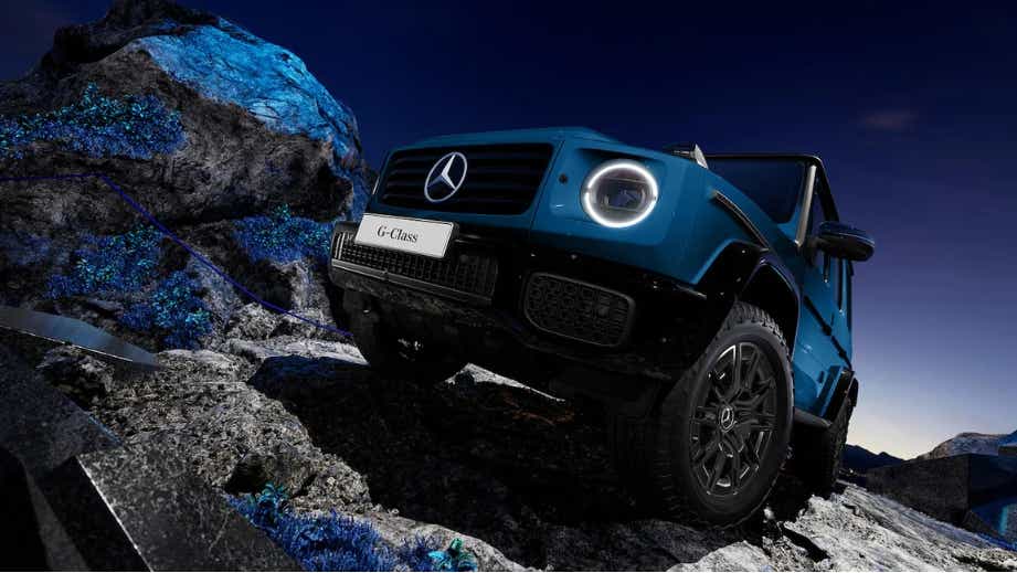 Front three-quarter view of a South Seas Blue Mango Mercedes-Benz G-Class Electric