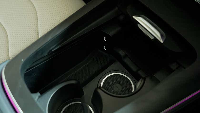 Center console cup holders and USB ports of a Mercedes-Benz E-Class