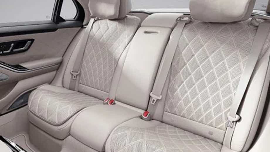 rear seat interior of a Designo Diamond White Mercedes-Benz S-Class