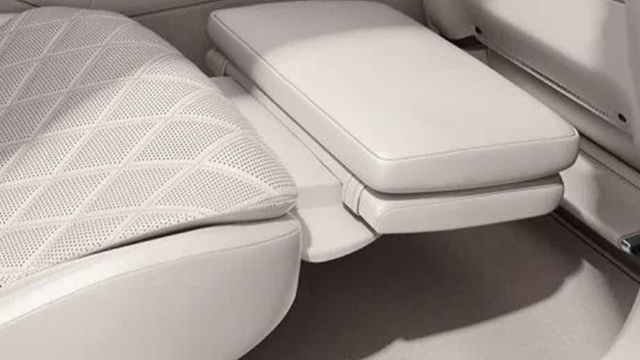 rear seat legrest close-up of a Designo Diamond White Mercedes-Benz S-Class