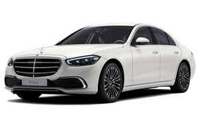 front three-quarter view of a Designo Diamond White Mercedes-Benz S-Class