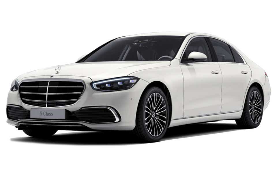 front three-quarter view of a Designo Diamond White Mercedes-Benz S-Class